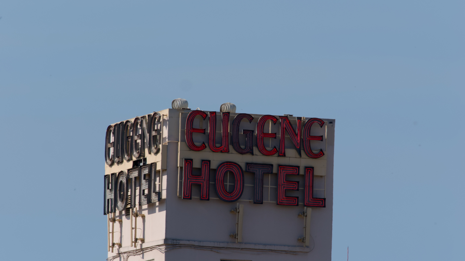 neon sign with some letters burnt out